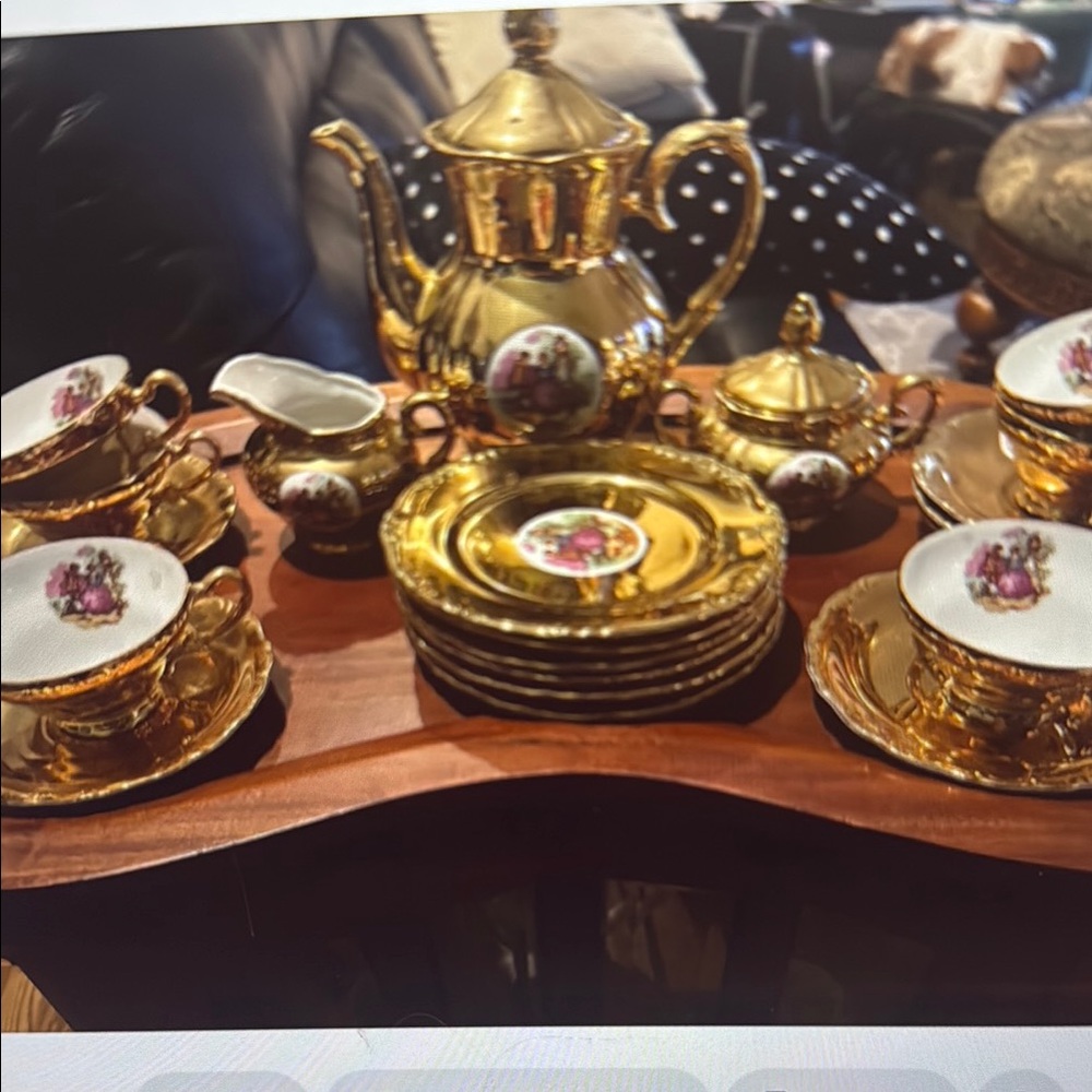 An Exquisite Arnart Gold 6 Place Tea Set with a Scene